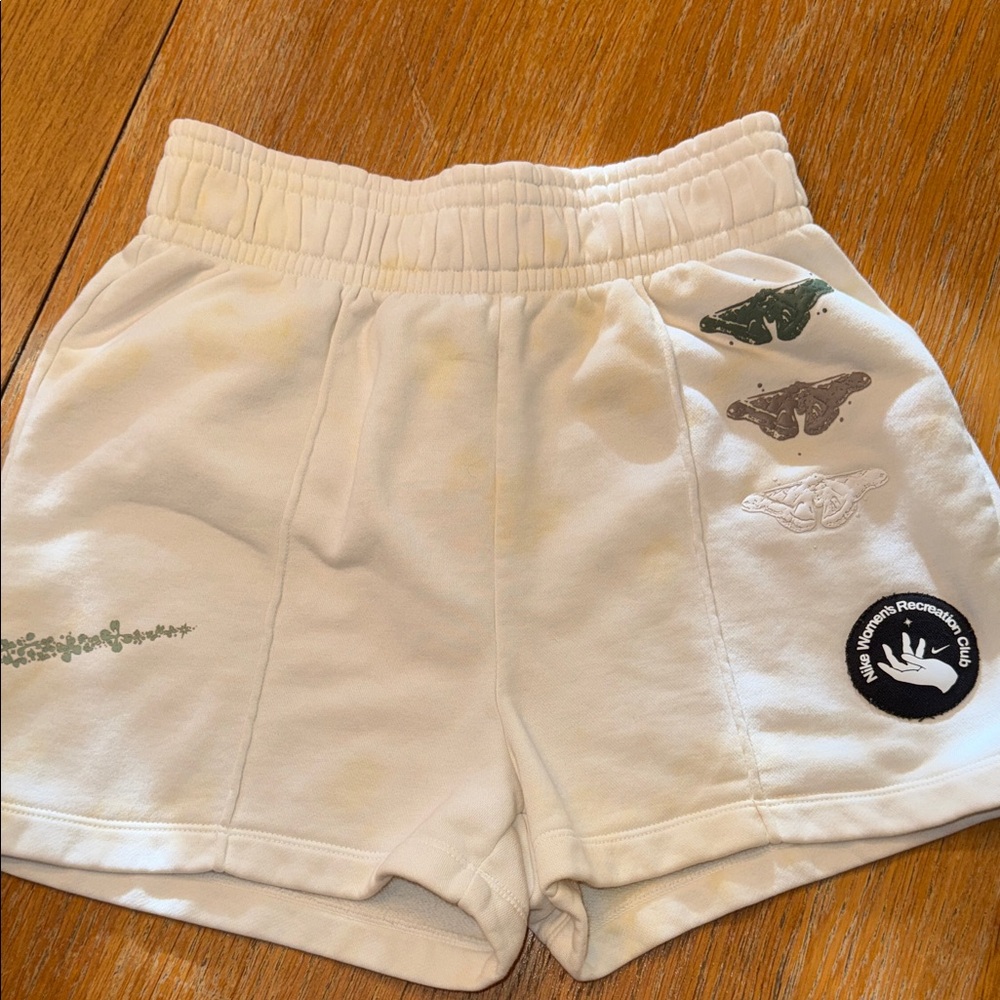 Nike Cream Athletic Shorts with Embroidered Designs